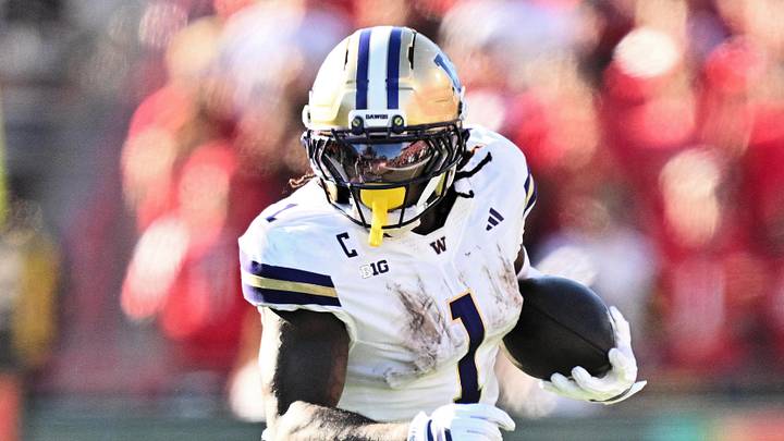 Oct 4, 2025; College Park, Maryland, USA;  Washington Huskies running back Jonah Coleman (1) carries the ball against the Maryland Terrapins at SECU Stadium. Mandatory Credit: Jamie Sabau-Imagn Images