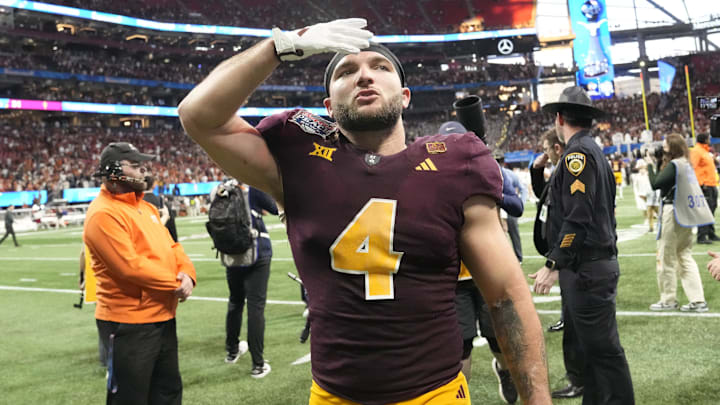 Arizona State running back Cam Skattebo (4) blows a kiss toward fans after Texas won 39-31 in double overtime in the Chick-fil-A Peach Bowl in Atlanta on Jan. 1, 2025. Arizona State running back Cam Skattebo (4) blows a kiss toward fans after Texas won 39-31 in double overtime in the Chick-fil-A Peach Bowl in Atlanta on Jan. 1, 2025.