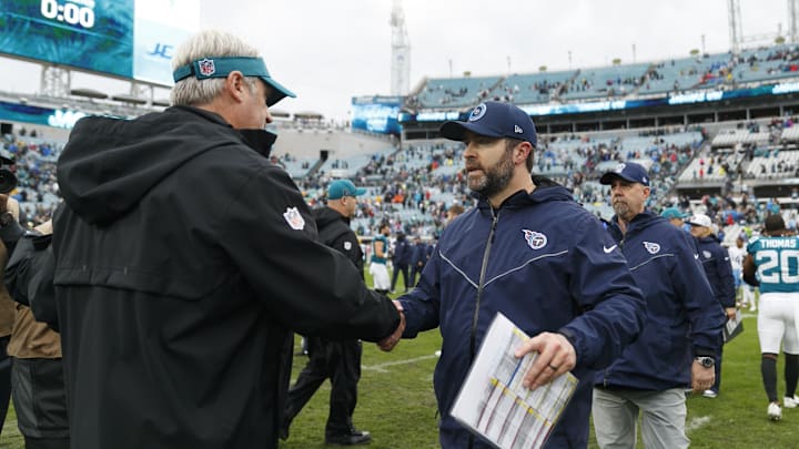 Dec 29, 2024; Jacksonville, Florida, USA; Jacksonville Jaguars head coach Doug Pederson and Tennessee Titans head coach Brian Callahan shake hands after the game at EverBank Stadium. Mandatory Credit: Morgan Tencza-Imagn Images