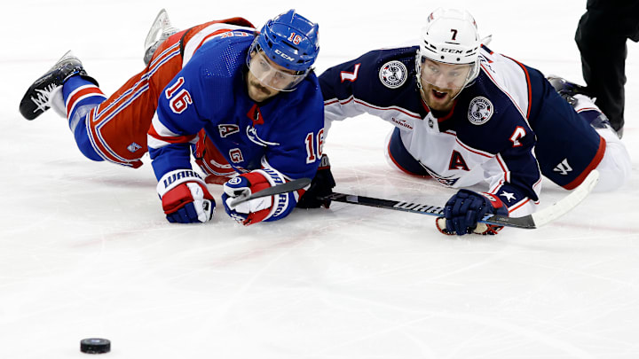Vincent Trocheck battles Sean Kuraly at the face-off dot