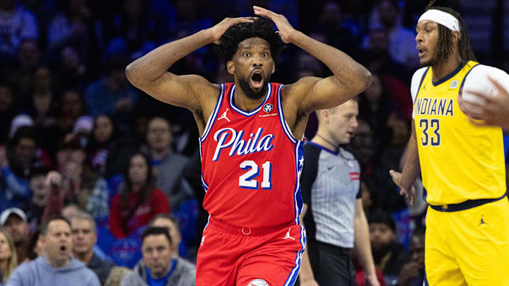 Dec 13, 2024; Philadelphia, Pennsylvania, USA; Philadelphia 76ers center Joel Embiid (21) reacts to a play against the Indiana Pacers during the first quarter at Wells Fargo Center. Mandatory Credit: Bill Streicher-Imagn Images Dec 13, 2024; Philadelphia, Pennsylvania, USA; Philadelphia 76ers center Joel Embiid (21) reacts to a play against the Indiana Pacers during the first quarter at Wells Fargo Center. Mandatory Credit: Bill Streicher-Imagn Images