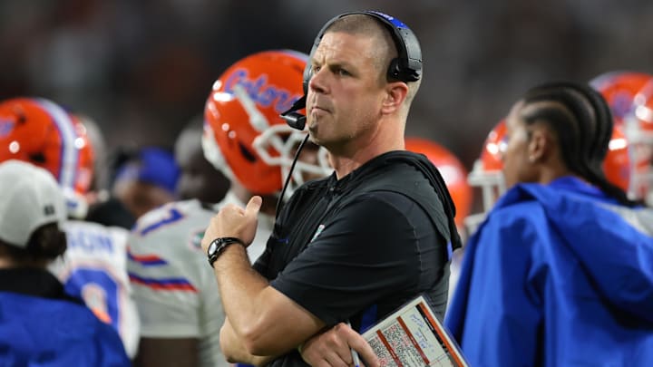 Sep 20, 2025; Miami Gardens, Florida, USA; Florida Gators head coach Billy Napier watches from the sideline against the Miami Hurricanes during the second quarter at Hard Rock Stadium. Mandatory Credit: Sam Navarro-Imagn Images