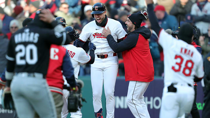 Cleveland Guardians outfielder Nolan Jones (22) is mobbed by teammates after his walk-of walk during the ninth inning of a Major League Baseball game against the Chicago White Sox at Progressive Field on Tuesday, April 8, 2025, in Cleveland, Ohio. Cleveland Guardians outfielder Nolan Jones (22) is mobbed by teammates after his walk-of walk during the ninth inning of a Major League Baseball game against the Chicago White Sox at Progressive Field on Tuesday, April 8, 2025, in Cleveland, Ohio.