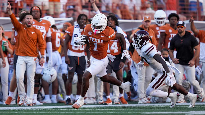 Sep 28, 2024; Austin, Texas, USA; Texas Longhorns wide receiver Johntay Cook II (1) runs from Mississippi State Bulldogs safety Corey Ellington (10) in the second half at Darrell K Royal-Texas Memorial Stadium. Mandatory Credit: Daniel Dunn-Imagn Images Sep 28, 2024; Austin, Texas, USA; Texas Longhorns wide receiver Johntay Cook II (1) runs from Mississippi State Bulldogs safety Corey Ellington (10) in the second half at Darrell K Royal-Texas Memorial Stadium. Mandatory Credit: Daniel Dunn-Imagn Images