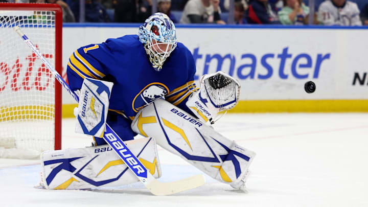 Nov 9, 2024; Buffalo, New York, USA;  Buffalo Sabres goaltender Ukko-Pekka Luukkonen (1) looks to make a save during the first period against the Calgary Flames at KeyBank Center. Mandatory Credit: Timothy T. Ludwig-Imagn Images