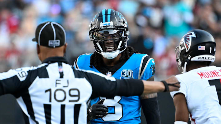 Oct 13, 2024; Charlotte, North Carolina, USA;  Carolina Panthers cornerback Jaycee Horn (8) is called for pass interferference on a pass intended for Atlanta Falcons wide receiver Darnell Mooney (1) in the first quarter at Bank of America Stadium. Mandatory Credit: Bob Donnan-Imagn Images