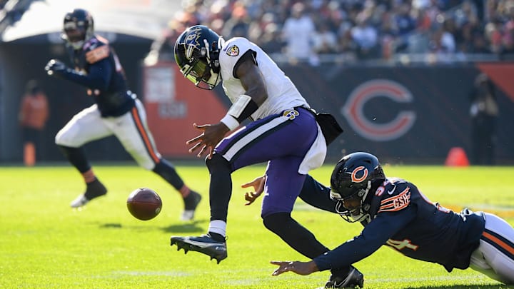 Tyler Huntley fumbles against the Bears after a hit by former Bear Robert Quinn in a 2021 game at Soldier Field. Tyler Huntley fumbles against the Bears after a hit by former Bear Robert Quinn in a 2021 game at Soldier Field.