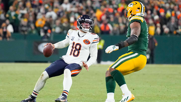 Dec 7, 2025; Green Bay, Wisconsin, USA; Chicago Bears quarterback Caleb Williams (18) looks for an open receiver during the fourth quarter against the Green Bay Packers at Lambeau Field. Mandatory Credit: Jeff Hanisch-Imagn Images Dec 7, 2025; Green Bay, Wisconsin, USA; Chicago Bears quarterback Caleb Williams (18) looks for an open receiver during the fourth quarter against the Green Bay Packers at Lambeau Field. Mandatory Credit: Jeff Hanisch-Imagn Images