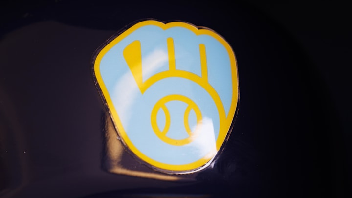 Jun 18, 2023; Milwaukee, Wisconsin, USA; A Milwaukee Brewers logo on a batting helmet in the dugout prior to the game against the Pittsburgh Pirates at American Family Field. Mandatory Credit: Jeff Hanisch-Imagn Images Jun 18, 2023; Milwaukee, Wisconsin, USA; A Milwaukee Brewers logo on a batting helmet in the dugout prior to the game against the Pittsburgh Pirates at American Family Field. Mandatory Credit: Jeff Hanisch-Imagn Images