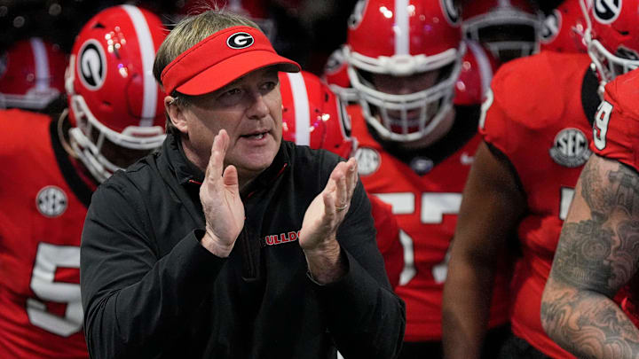 Georgia coach Kirby Smart takes the field with his team before the start of the SEC championship game against Texas in Atlanta, on Saturday, Dec. 7, 2024. Georgia coach Kirby Smart takes the field with his team before the start of the SEC championship game against Texas in Atlanta, on Saturday, Dec. 7, 2024.