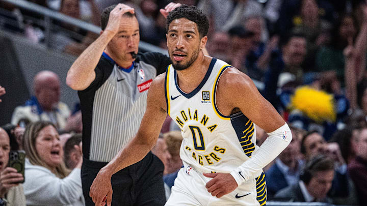 Feb 26, 2025; Indianapolis, Indiana, USA; Indiana Pacers guard Tyrese Haliburton (0) celebrates a made basket in the first half against the Toronto Raptors at Gainbridge Fieldhouse. Mandatory Credit: Trevor Ruszkowski-Imagn Images