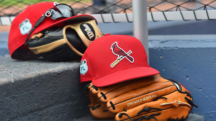 Mar 3, 2017; West Palm Beach, FL, USA; A view of St. Louis Cardinals hats and gloves on the steps of the dugout in the game against the Washington Nationals at The Ballpark of the Palm Beaches. Mandatory Credit: Jasen Vinlove-Imagn Images