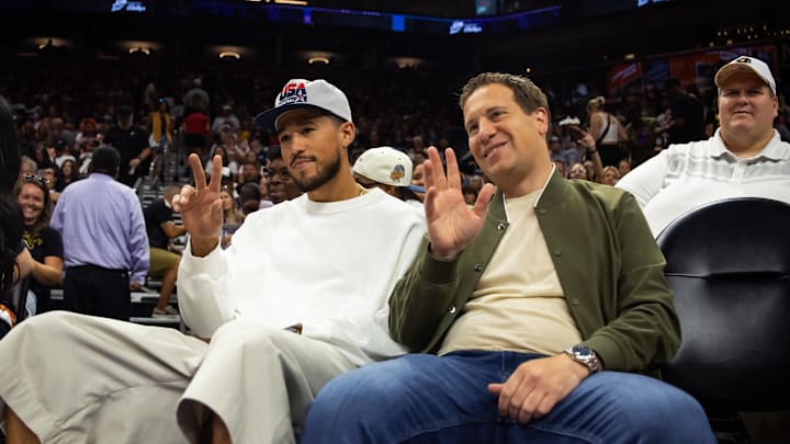 Devin Booker and Mat Ishbia sat together at a Phoenix Mercury game last season.