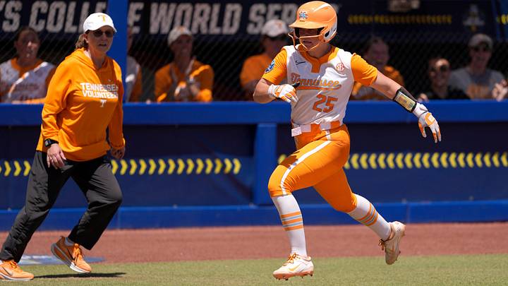 Tennessee Lady Volunteers infielder Ella Dodge (25) runs home to score in the fourth inning of a Women's College World Series softball game between the University of Texas Longhorns and the Tennessee Lady Volunteers at Devon Park in Oklahoma City, Monday, June 1, 2026.
