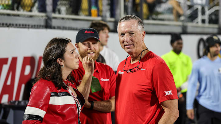 Houston Cougars head coach Willie Fritz (right) before the game against the UCF Knights at Acrisure Bounce House. 