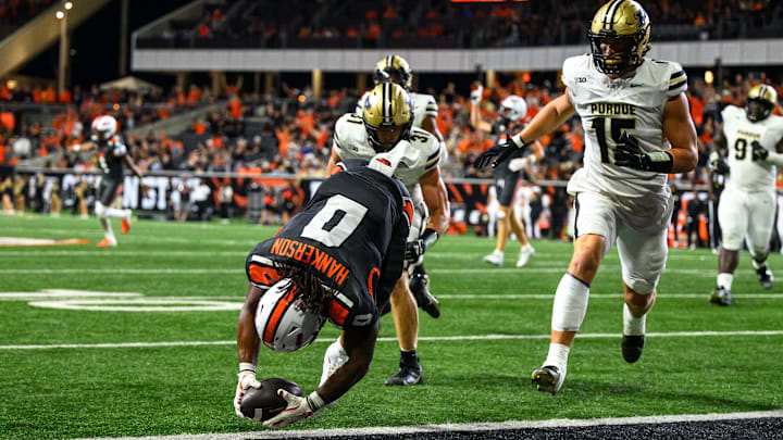 Sep 21, 2024; Corvallis, Oregon, USA; Oregon State Beavers running back Anthony Hankerson (0) dives into the end zone during the second half against the Purdue Boilermakers at Reser Stadium. Mandatory Credit: Craig Strobeck-Imagn Images