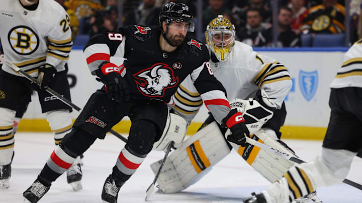 Dec 27, 2023; Buffalo, New York, USA;  Buffalo Sabres right wing Alex Tuch (89) looks for the loose puck during the second period against the Boston Bruins at KeyBank Center. Mandatory Credit: Timothy T. Ludwig-USA TODAY Sports