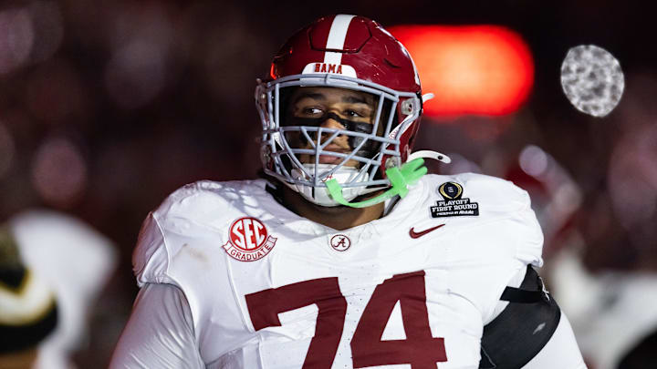 Dec 19, 2025; Norman, OK, USA; Alabama Crimson Tide offensive lineman Kadyn Proctor (74) against the Oklahoma Sooners during the CFP National Playoff First Round at Gaylord Family Oklahoma Memorial Stadium. Mandatory Credit: Mark J. Rebilas-Imagn Images