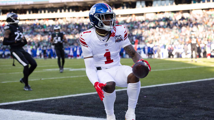 Jan 5, 2025; Philadelphia, Pennsylvania, USA; New York Giants wide receiver Malik Nabers (1) scores a touchdown against the Philadelphia Eagles during the fourth quarter at Lincoln Financial Field.  