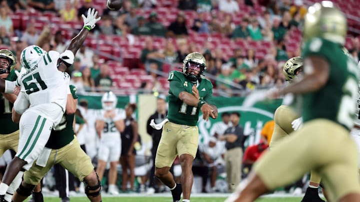 Byrum Brown accounted for five touchdowns Friday night -- four by passing and another on the ground -- in USF's win over Charlotte. 