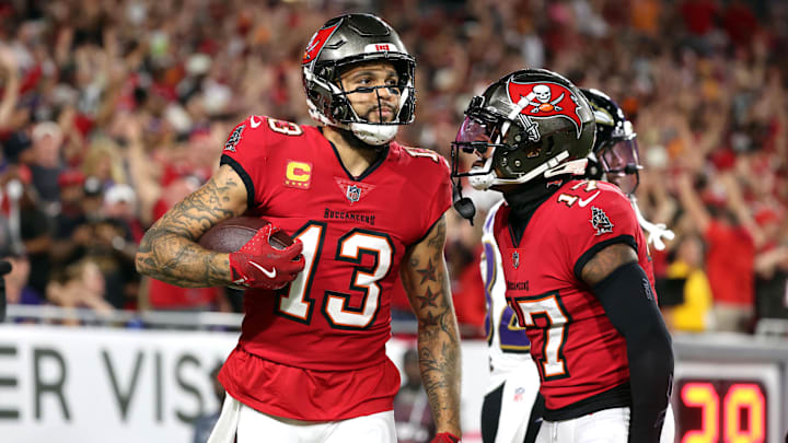 Oct 21, 2024; Tampa, Florida, USA; Tampa Bay Buccaneers wide receiver Mike Evans (13) catches the ball for a touchdown  against the Baltimore Ravens during the first quarter at Raymond James Stadium. Mandatory Credit: Kim Klement Neitzel-Imagn Images