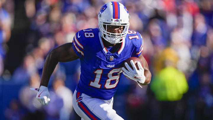 Buffalo Bills wide receiver Amari Cooper runs with the ball after making a catch against the Tennessee Titans