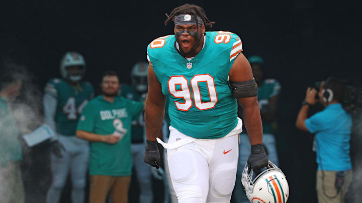 Miami Dolphins defensive tackle Kenneth Grant (90) enters the field before the game against the Cincinnati Bengals at Hard Rock Stadium in Week 16.
