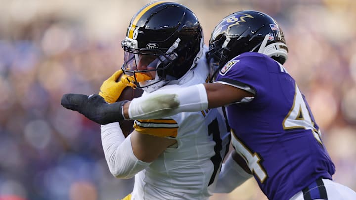 Dec 7, 2025; Baltimore, Maryland, USA; Pittsburgh Steelers wide receiver Adam Thielen (16) makes a catch against Baltimore Ravens cornerback Marlon Humphrey (44) during the first half at M&T Bank Stadium.