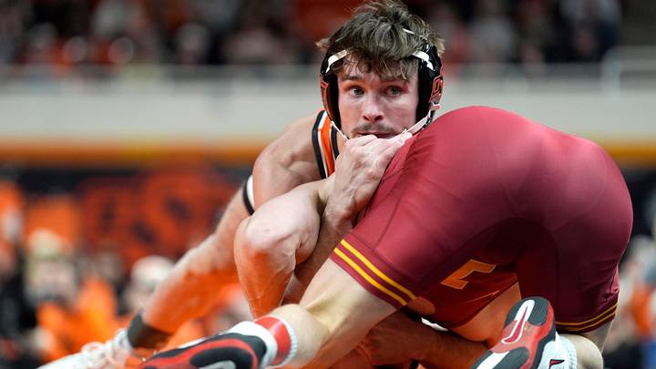 Oklahoma State's Troy Spratley wrestles Iowa State's Stevo Poulin. Oklahoma State's Troy Spratley wrestles Iowa State's Stevo Poulin.