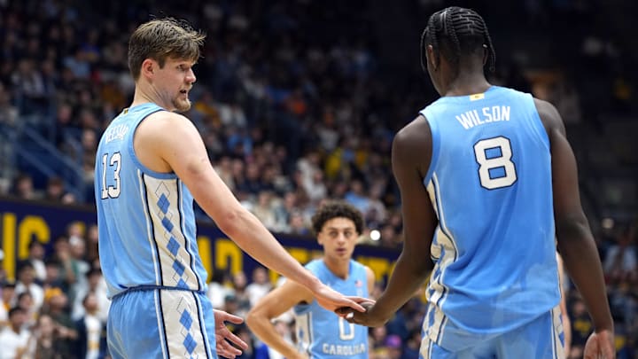 Jan 17, 2026; Berkeley, California, USA; North Carolina Tar Heels center Henri Veesaar (13) and forward Caleb Wilson (8) slap hands during the second half against the California Golden Bears at Haas Pavilion. Mandatory Credit: Darren Yamashita-Imagn Images