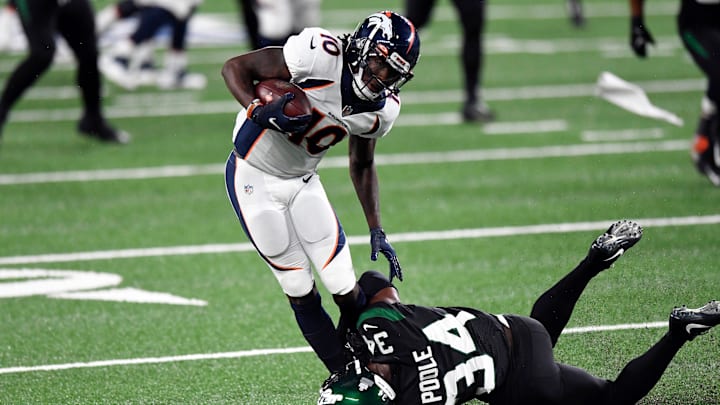 New York Jets cornerback Brian Poole (34) tackles Denver Broncos wide receiver Jerry Jeudy (10) in the second half. The Jets lose to the Broncos, 37-28, at MetLife Stadium on Thursday, Oct. 1, 2020, in East Rutherford.