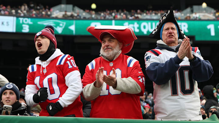 Dec 28, 2025; East Rutherford, New Jersey, USA; New England Patriots fans cheer during the first quarter of the game against the New York Jets at MetLife Stadium. Mandatory Credit: Vincent Carchietta-Imagn Images