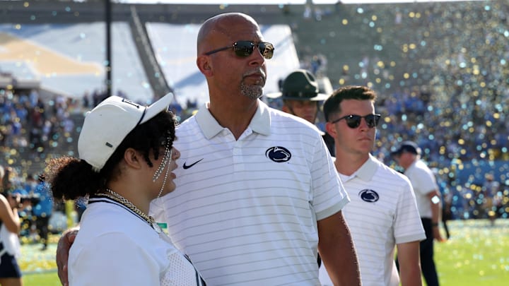 Oct 4, 2025; Pasadena, California, USA;  Penn State Nittany Lions head coach James Franklin (middle) looks on after defeated by UCLA Bruins 42-37 at Rose Bowl. 