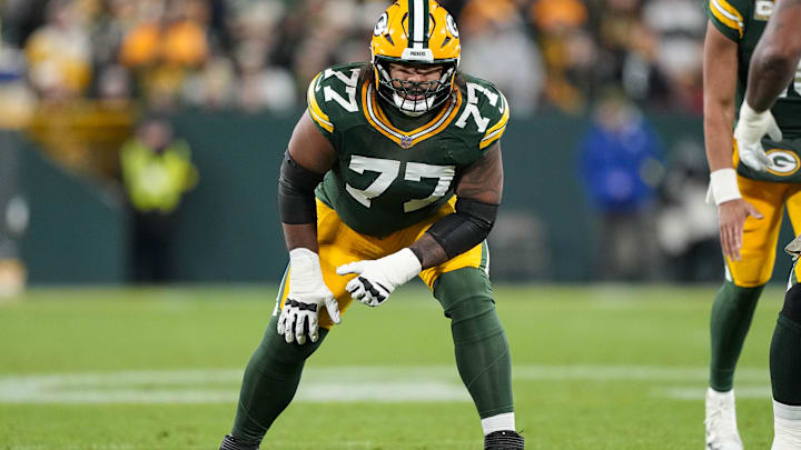 Nov 10, 2025; Green Bay, Wisconsin, USA;  Green Bay Packers offensive tackle Jordan Morgan (77) during the game against the Philadelphia Eagles at Lambeau Field. Mandatory Credit: Jeff Hanisch-Imagn Images
