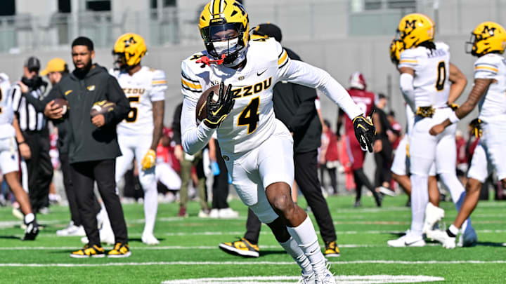 Oct 12, 2024; Amherst, Massachusetts, USA; Missouri Tigers wide receiver James Madison II (4) warms up before a game against the Massachusetts Minutemen at Warren McGuirk Alumni Stadium. Mandatory Credit: Eric Canha-Imagn Images