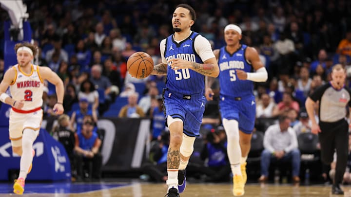Orlando Magic guard Cole Anthony (50) controls the ball against the Golden State Warriors in the first quarter at Kia Center. 