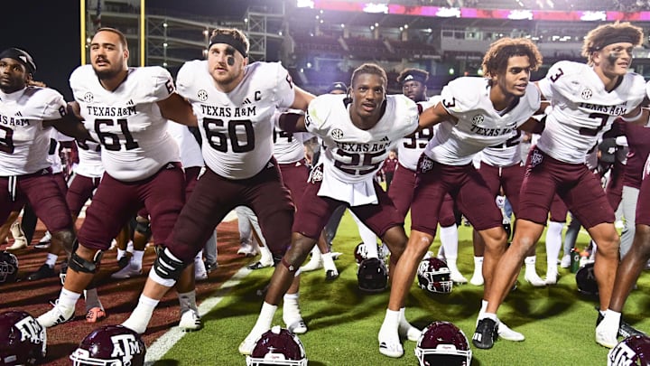 Oct 19, 2024; Starkville, Mississippi, USA; Texas A&M Aggies players react after defeating the Mississippi State Bulldogs at Davis Wade Stadium at Scott Field. Mandatory Credit: Matt Bush-Imagn Images