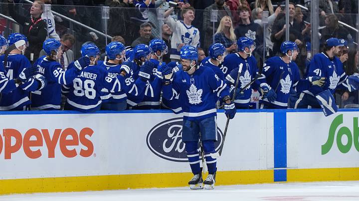 Oct 15, 2026; Toronto, Ontario, CAN; Toronto Maple Leafs right wing Kirill Marchenko (86) celebrates at the bench after scoring his third goal against the Buffalo Sabres during the second period at Scotiabank Arena. Mandatory Credit: Nick Turchiaro-Imagn Images Oct 15, 2026; Toronto, Ontario, CAN; Toronto Maple Leafs right wing Kirill Marchenko (86) celebrates at the bench after scoring his third goal against the Buffalo Sabres during the second period at Scotiabank Arena. Mandatory Credit: Nick Turchiaro-Imagn Images