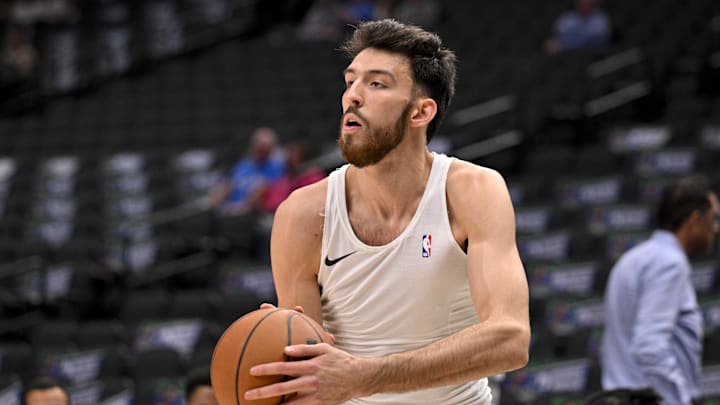 Oct 27, 2025; Dallas, Texas, USA; Oklahoma City Thunder center Chet Holmgren (7) warms up before the game against the Dallas Mavericks at the American Airlines Center. Mandatory Credit: Jerome Miron-Imagn Images
