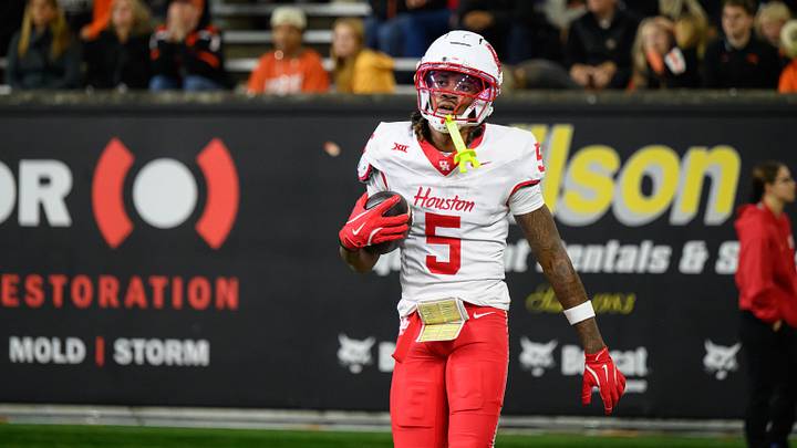 Sep 26, 2025; Corvallis, Oregon, USA; Houston Cougars wide receiver Stephon Johnson (5) scores a touchdown on a pass during the fourth quarter against the Oregon State Beavers at Reser Stadium. Mandatory Credit: Craig Strobeck-Imagn Images Sep 26, 2025; Corvallis, Oregon, USA; Houston Cougars wide receiver Stephon Johnson (5) scores a touchdown on a pass during the fourth quarter against the Oregon State Beavers at Reser Stadium. Mandatory Credit: Craig Strobeck-Imagn Images