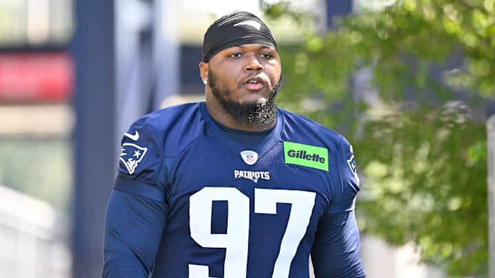Jul 23, 2025; Foxborough, MA, USA; New England Patriots defensive end Milton Williams (97) walks to the practice field for training camp at Gillette Stadium. Mandatory Credit: Eric Canha-Imagn Images Jul 23, 2025; Foxborough, MA, USA; New England Patriots defensive end Milton Williams (97) walks to the practice field for training camp at Gillette Stadium. Mandatory Credit: Eric Canha-Imagn Images