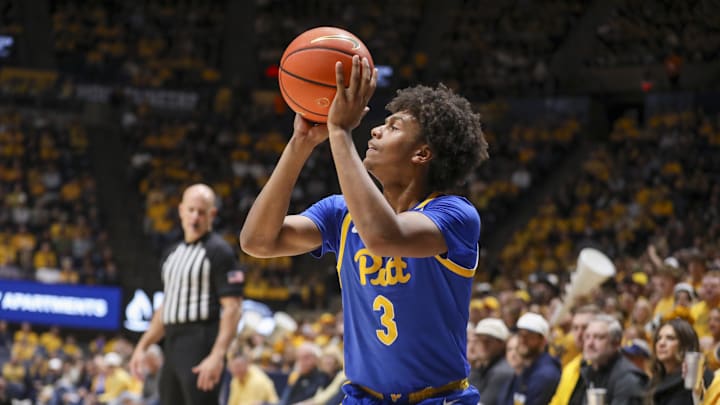 Nov 13, 2025; Morgantown, West Virginia, USA; Pittsburgh Panthers guard Brandin Cummings (3) shoots a three pointer during the first half against the West Virginia Mountaineers at WVU Coliseum. Mandatory Credit: Ben Queen-Imagn Images