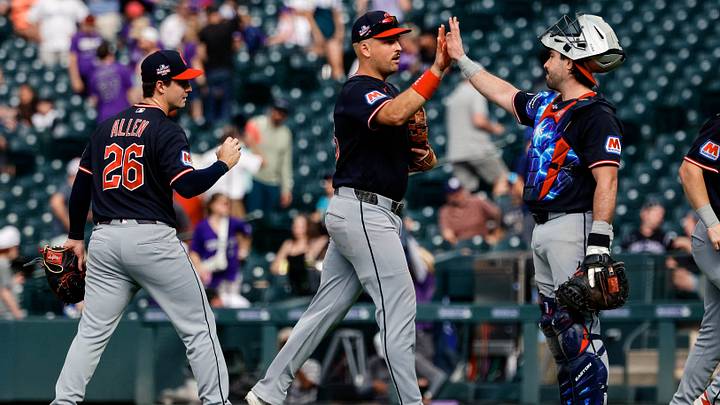 Aug 23, 2026: Cleveland Guardians relief pitcher Logan Allen (26) and first baseman Nathaniel Lowe (46) and catcher Austin Hedges (27) celebrate after the game against the Cleveland Guardians at Coors Field. Credit: Isaiah J. Downing-Imagn Images