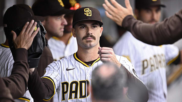 Sep 18, 2024; San Diego, California, USA; San Diego Padres starting pitcher Dylan Cease (84) is congratulated in the dugout after a pitching change in the ninth inning against the Houston Astros at Petco Park. Sep 18, 2024; San Diego, California, USA; San Diego Padres starting pitcher Dylan Cease (84) is congratulated in the dugout after a pitching change in the ninth inning against the Houston Astros at Petco Park.