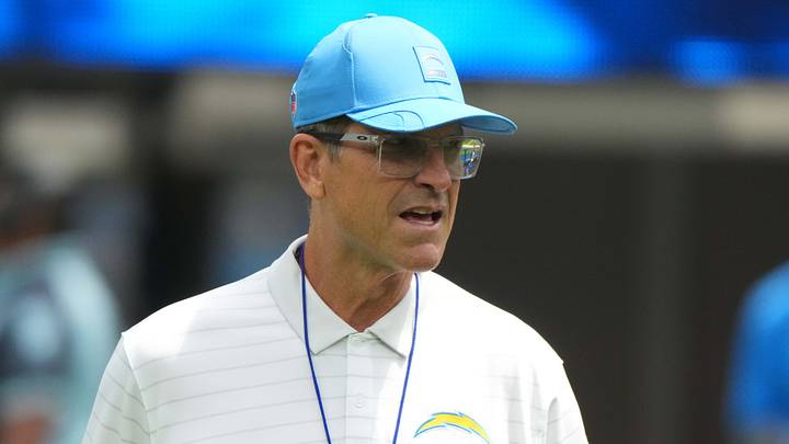 Aug 10, 2025; Inglewood, California, USA; Los Angeles Chargers head coach Jim Harbaugh reacts during the game against he New Orleans Saints at SoFi Stadium. Mandatory Credit: Kirby Lee-Imagn Images
