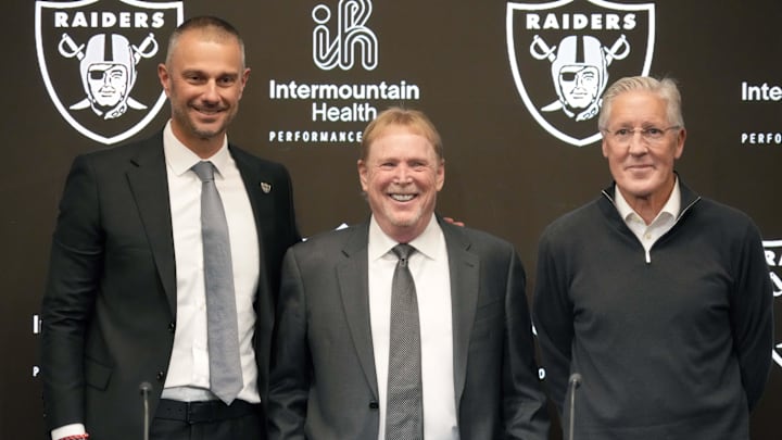 Jan 27, 2025; Las Vegas, NV, USA; Las Vegas Raiders general manager John Spytek (left), owner Mark Davis (center) and coach Pete Carroll pose at press conference at Intermountain Health Performance Center. Mandatory Credit: Kirby Lee-Imagn Images Jan 27, 2025; Las Vegas, NV, USA; Las Vegas Raiders general manager John Spytek (left), owner Mark Davis (center) and coach Pete Carroll pose at press conference at Intermountain Health Performance Center. Mandatory Credit: Kirby Lee-Imagn Images