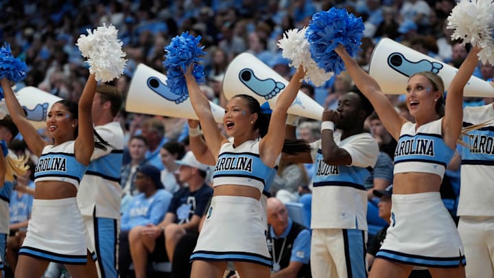 Oct 12, 2024; Chapel Hill, NC, USA;  North Carolina Tar Heels cheerleaders perform in the first half at the Dean E. Smith Center. Mandatory Credit: Bob Donnan-Imagn Images