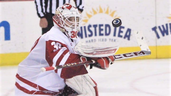 Wisconsin's Eli Pulver makes a save during the second period of the Badgers' 4-1 victory over No. 2 Michigan Friday Feb. 20, 2026 at the Kohl Center in Madison, Wis. Wisconsin's Eli Pulver makes a save during the second period of the Badgers' 4-1 victory over No. 2 Michigan Friday Feb. 20, 2026 at the Kohl Center in Madison, Wis.