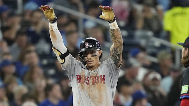 Sep 23, 2024; Toronto, Ontario, CAN; Boston Red Sox left fielder Jarren Duran (16) celebrates his triple against the Toronto Blue Jays during the sixth inning at Rogers Centre. Mandatory Credit: John E. Sokolowski-Imagn Images