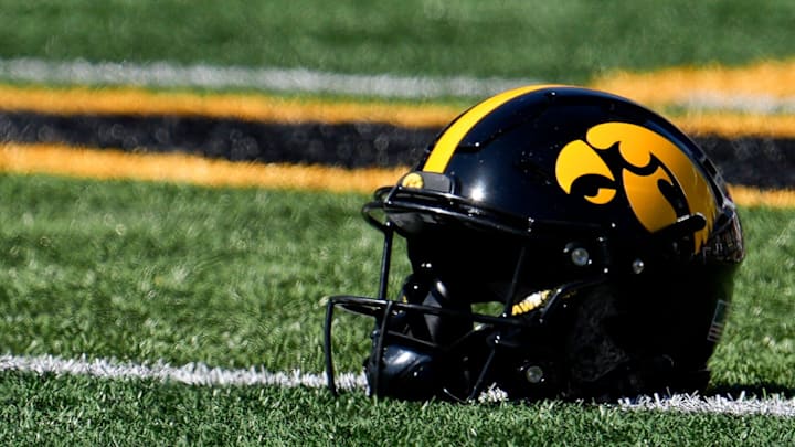 An Iowa Hawkeyes helmet lays on the field before a football game against the Indiana Hoosiers Sept. 27, 2025 at Kinnick Stadium in Iowa City, Iowa. An Iowa Hawkeyes helmet lays on the field before a football game against the Indiana Hoosiers Sept. 27, 2025 at Kinnick Stadium in Iowa City, Iowa.